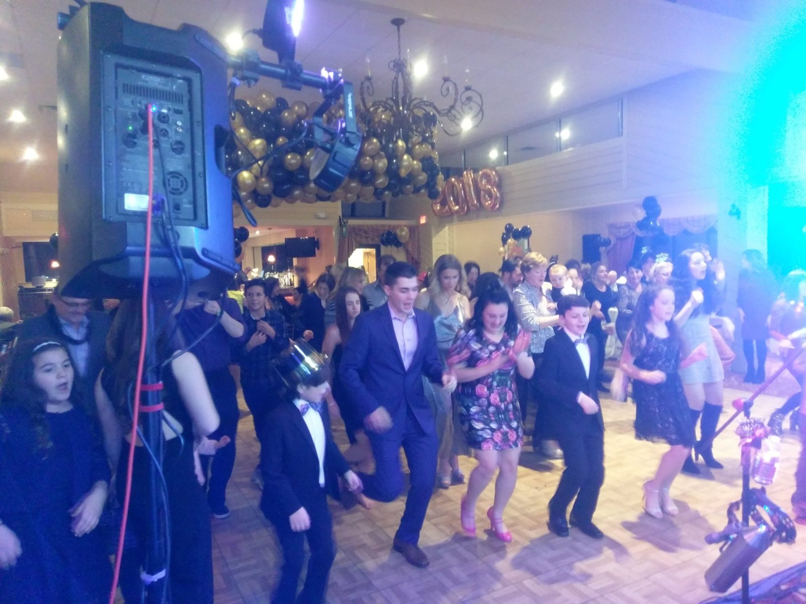 Corporate event in an uplit ballroom